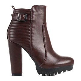 Maroon boots on a high Mango post claret red