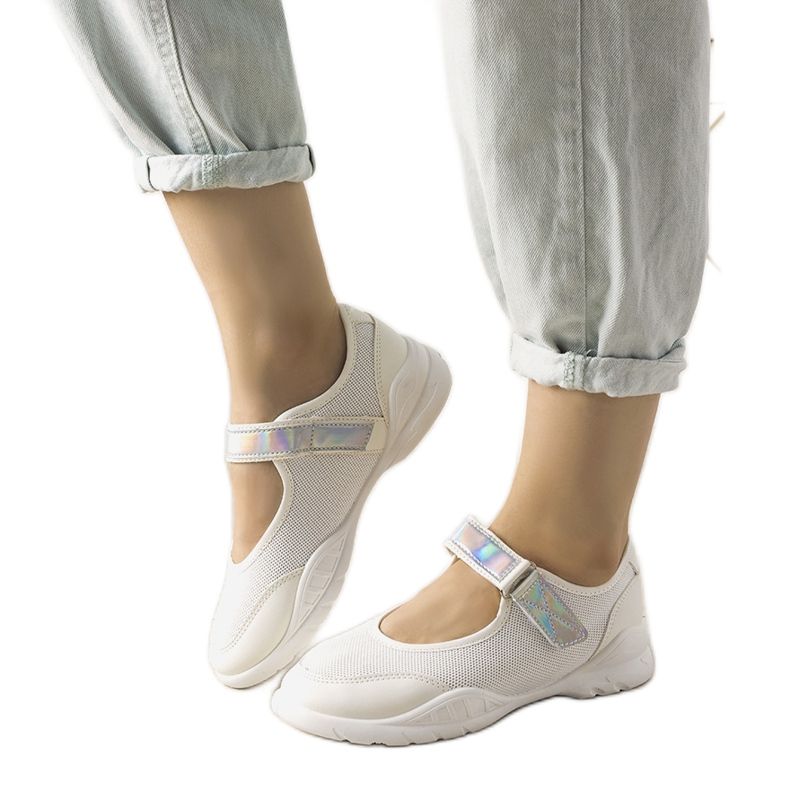 White sports shoes with a holographic insert Melania