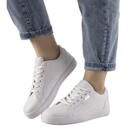 White and silver sneakers from Boomshom