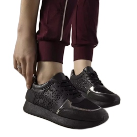 Black sports sneakers with an openwork Festival pattern