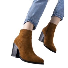 Camel cowboy boots on Milady's post brown