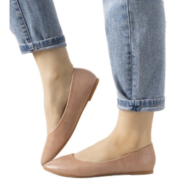 Pink ballerinas in the Camilia crocodile skin pattern