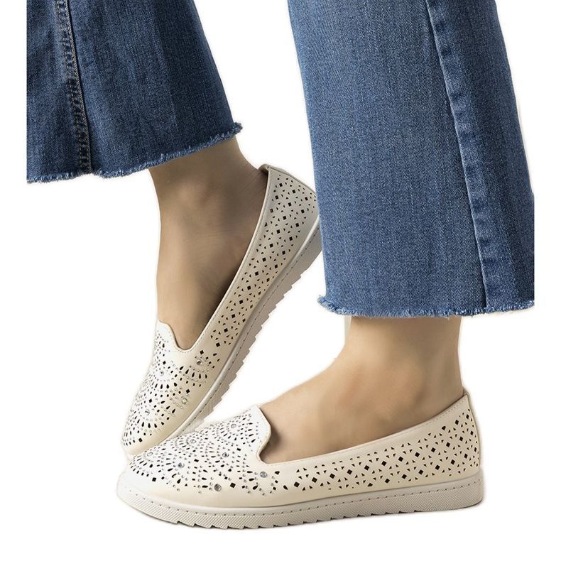 White loafers with an openwork Loretta pattern