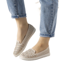 Beige moccasins with an openwork Loretta pattern