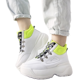 White sneakers with a high Eloquence sole