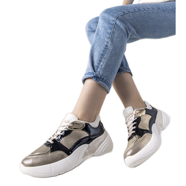 Golden sneakers with a high sole Rude black
