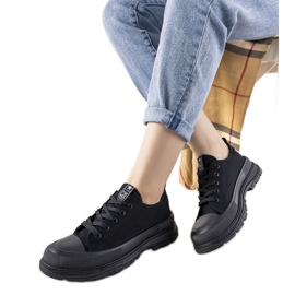 Black sneakers on a thick Beat sole Black sneakers on a thick Beat sole