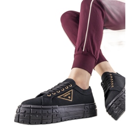 Black sneakers on a thick Giselle sole