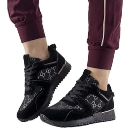 Black sneakers with metallic elements Moves
