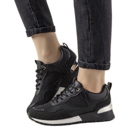 Black sneakers with a Zariza crocodile skin motif