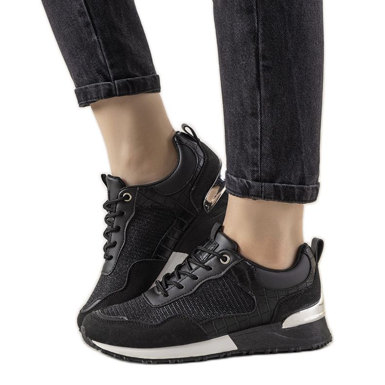 Black sneakers with a Zariza crocodile skin motif
