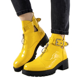 Yellow boots in the Hadley crocodile skin pattern