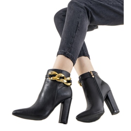 Black elegant boots on the Abilene post
