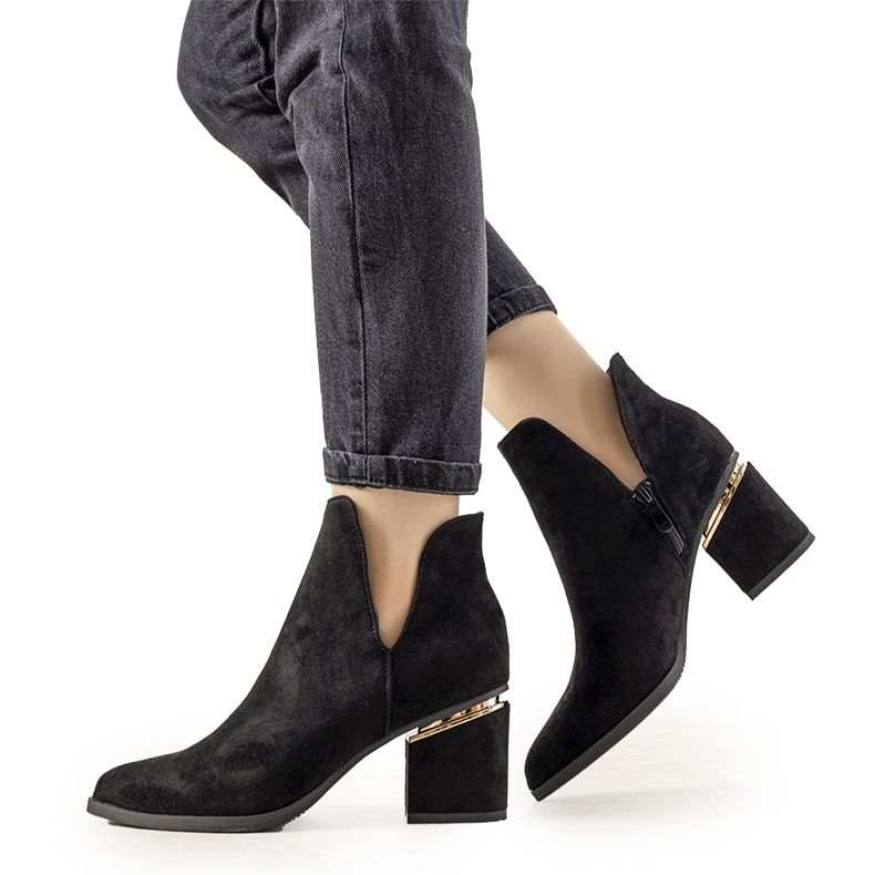 Black elegant boots with cutouts from Josie