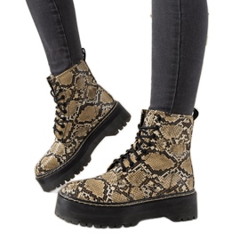 Beige boots with a Deross snake skin pattern brown