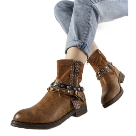 Brown boots with a studded Elffie headband