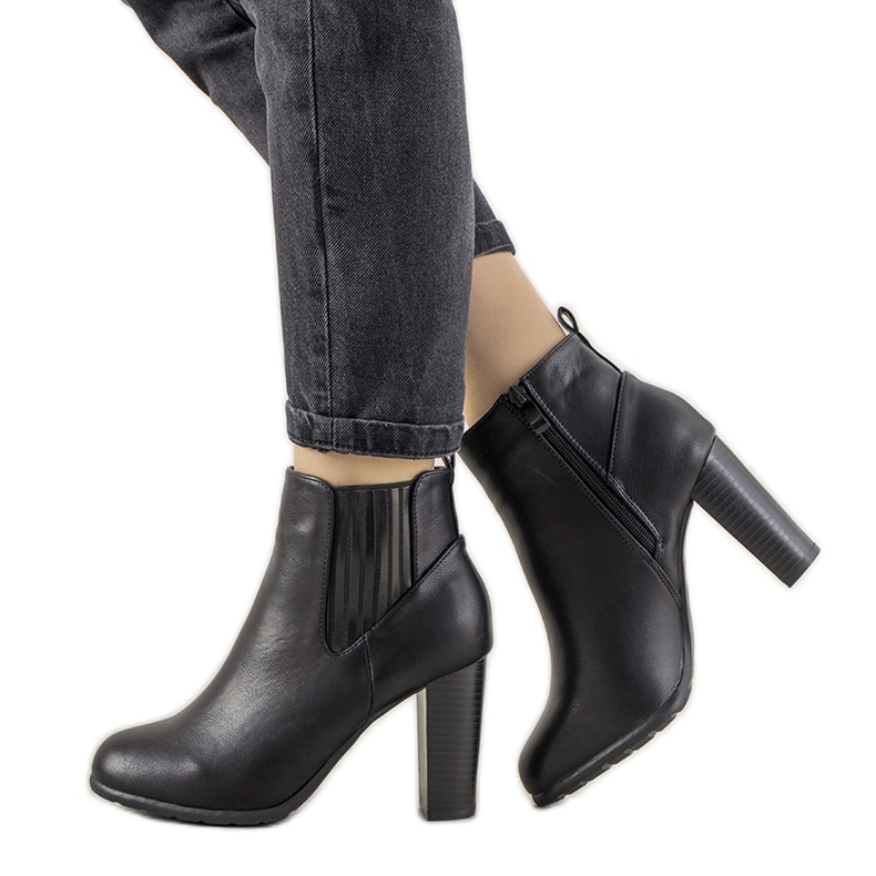 Black classic women's Castellanos boots on the post
