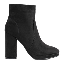 Merrados women's black boots on the post
