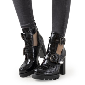 Black lacquered ankle boots on the Step post