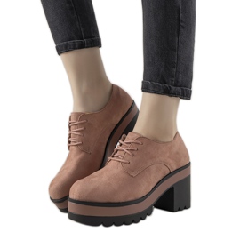 Pink lace-up ankle boots on the Cecina post