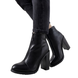 Black elegant women's boots on the Aland post