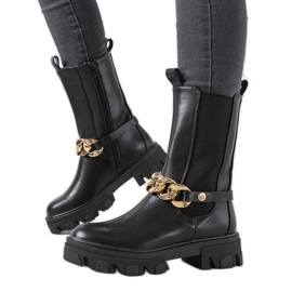 Black boots with a gold chain from Luce Black boots with a gold chain from Luce