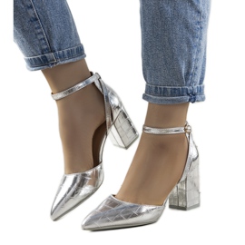 Silver pumps on the Davies post