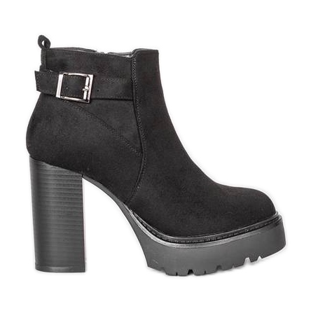 Black ankle boots on Katie's post