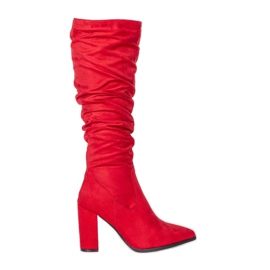 Red boots on a high Swing post Red boots on a high Swing post