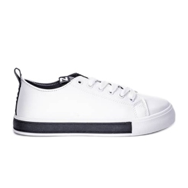 Alison's white sneakers on a flat sole black