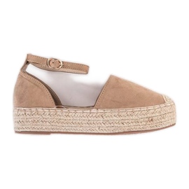 Beige espadrilles on the Summer platform