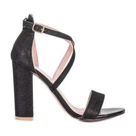Black sandals on a Silver Dust post Black sandals on a Silver Dust post