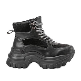 Black sneakers on the Big City Girl platform Black sneakers on the Big City Girl platform