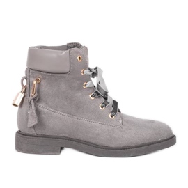 Jessie's gray hiking boots with a padlock grey