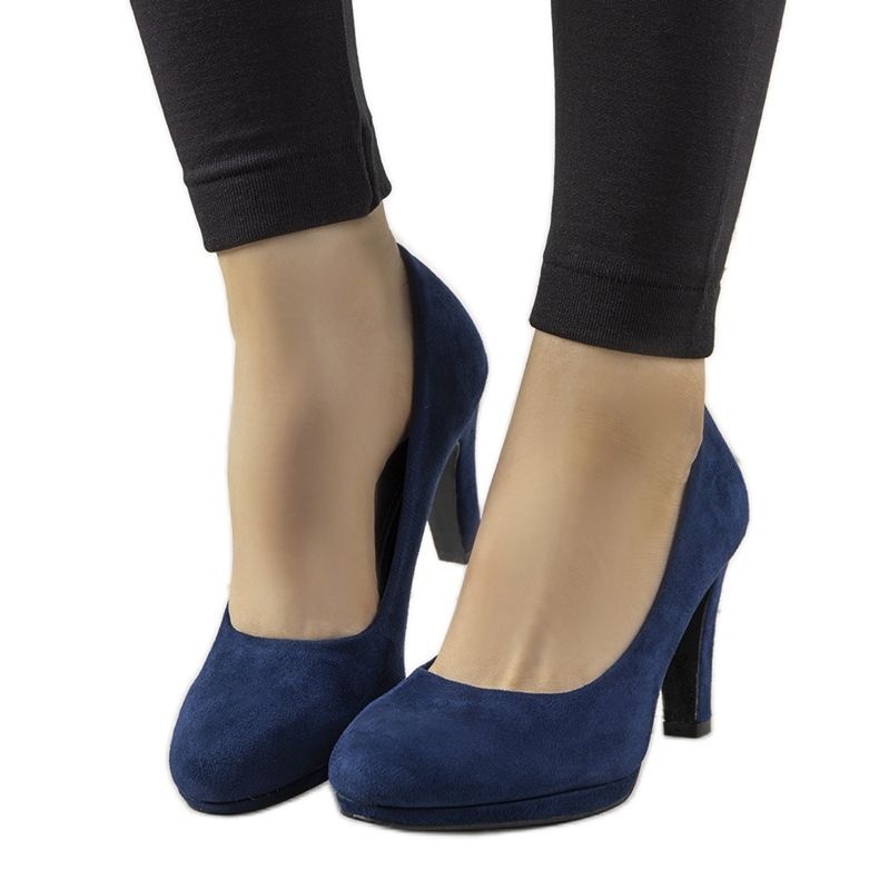 Navy blue pumps on a Sara eco-leather pillar