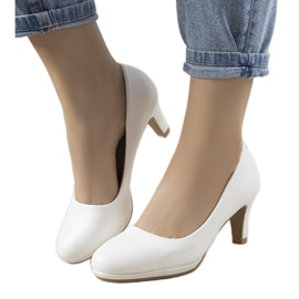 White pumps on a stiletto heel made of eco-leather Fink