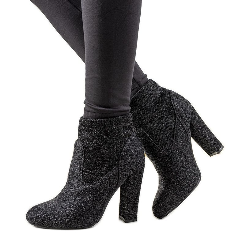 Black shiny ankle boots on the Birgit post