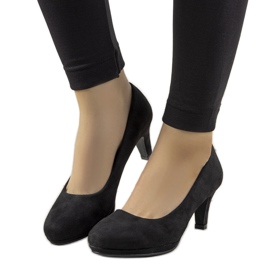 Black pumps on a pin by Eiffel