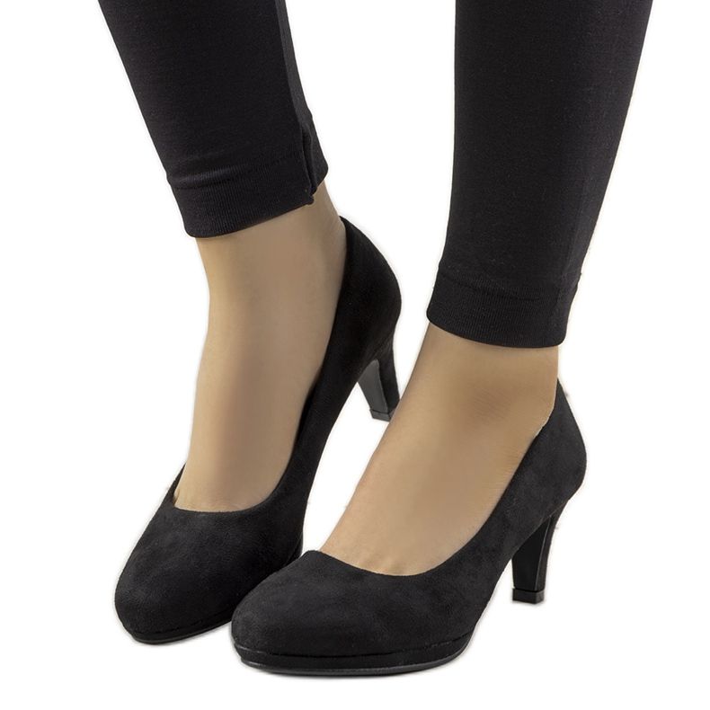 Black pumps on a pin by Eiffel