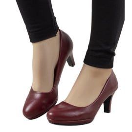 Burgundy pumps on a Fink leather heel red