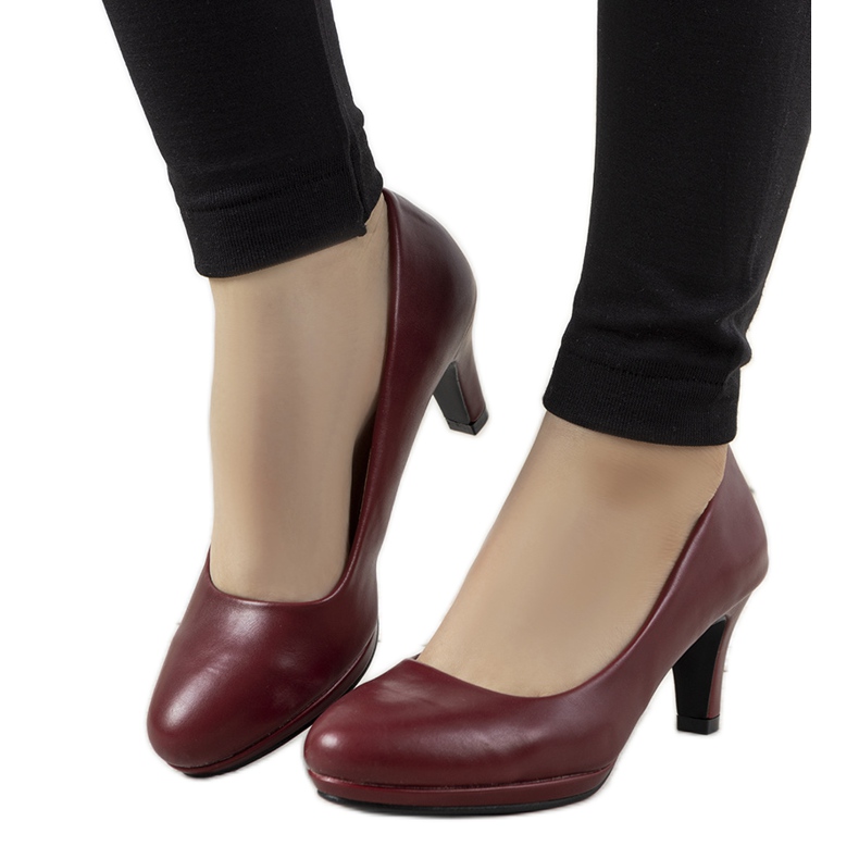 Burgundy pumps on a Fink leather heel red