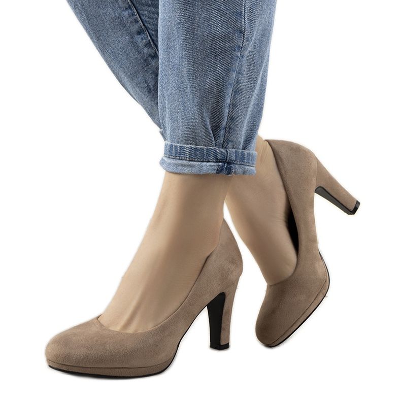 Beige pumps on a Sara eco-leather pillar Beige pumps on a Sara eco-leather pillar