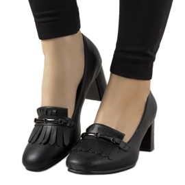 Black pumps on a post made of Alice's eco-leather Black pumps on a post made of Alice's eco-leather