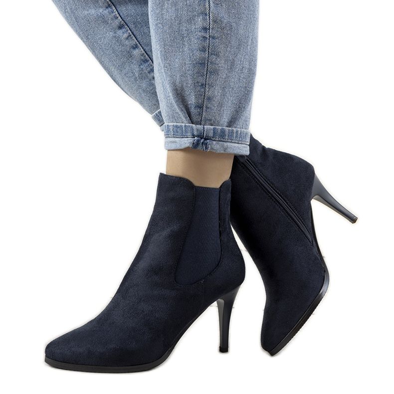 Navy blue boots on a Varela heel