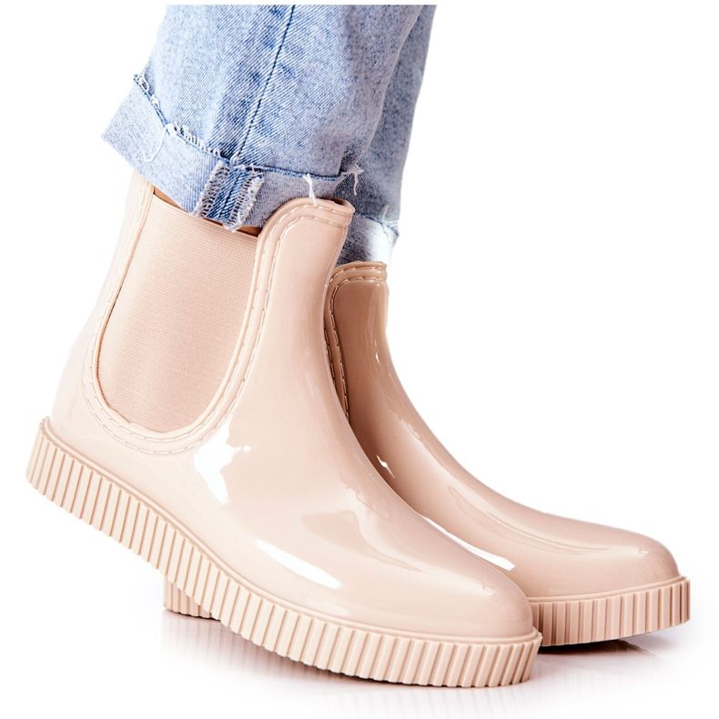 PS1 Shiny Rain Boots On A Beige Waterfall Platform
