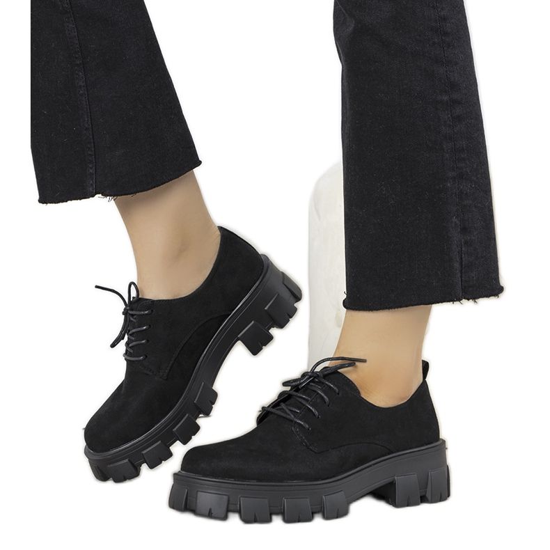 Black shoes on a thick Melisande sole