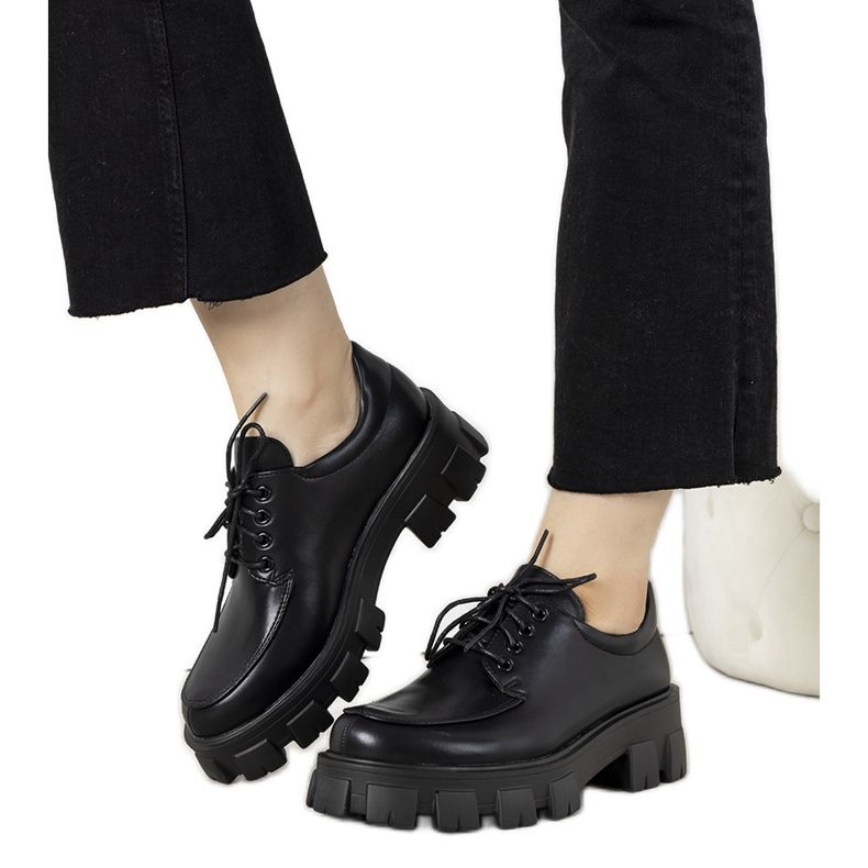 Black shoes on a thick Lamare sole