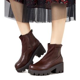 Brown boots on a high Halette sole