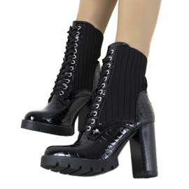 Black patent ankle boots on the Mavise post Black patent ankle boots on the Mavise post