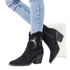 Black cowboy boots with Corinne snake skin inserts Black cowboy boots with Corinne snake skin inserts